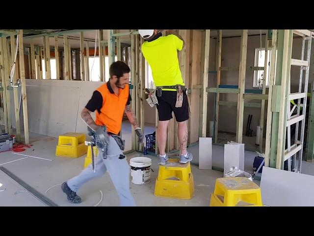 Construction Crew Hanging New Drywall Ceiling Fast