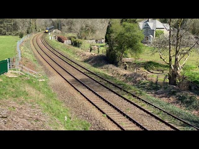 802110 passing respryn bridge, with horn sounding