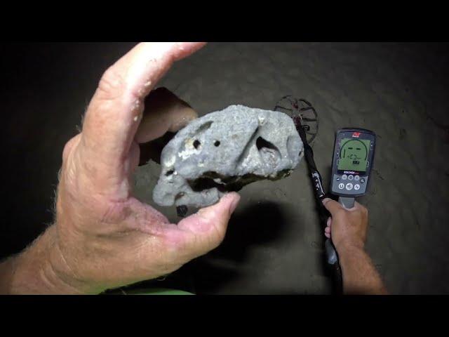 Beach metal detecting in the dark