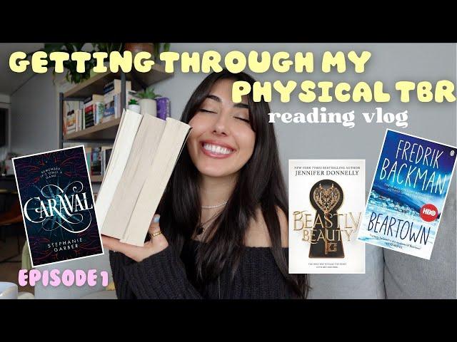 getting through every book on my physical tbr part 1  spoiler free reading vlog *tbr takedown*