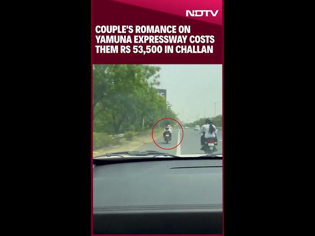 Woman Sits On Bike's Petrol Tank, Hugs Man Without Helmet On Yamuna Expressway, Challan Issued