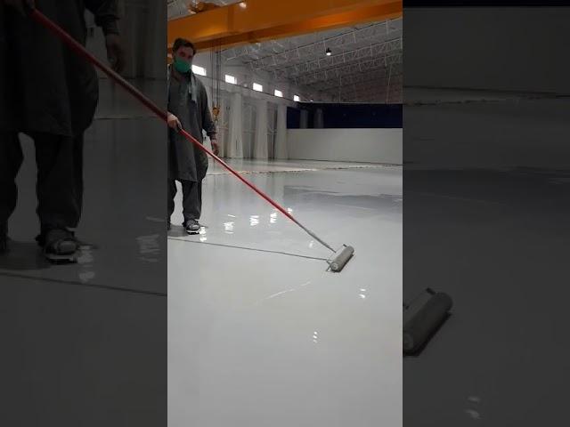 Spike Roller over Epoxy Flooring by Mitchell construction chemicals
