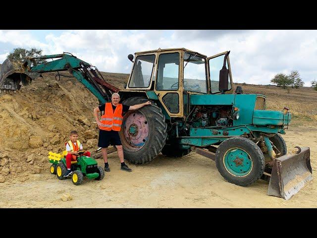 Dima repareert een tractor en werkt bij een wasstraat