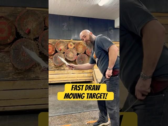 World champion knife thrower throwing fast draw at moving target!