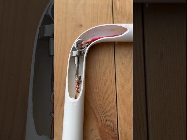 So simple yet effective – a smart idea for running a cable through a pipe