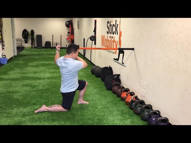 Psoas And T-Spine Rotational Stretch - Stick Mobility Exercises