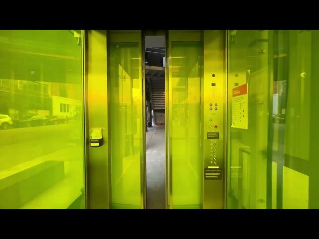 Neon Yellow Unknown Full-Glass Hydraulic Elevator at High Line in New York City, NY.