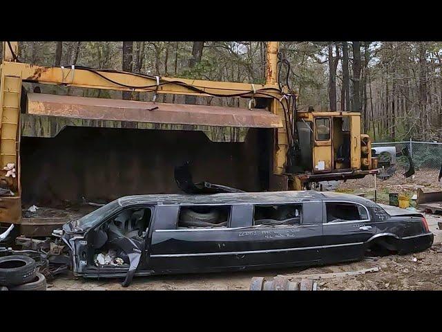 Limousine Crushing cars Limo town car gets folded up and crushed