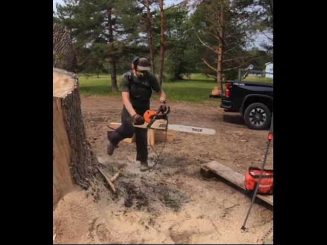 Close call while chainsaw carving