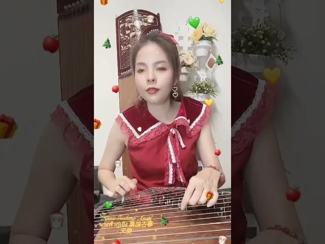 Merry Christmas ￼ #พิณจีนเสียงสวรรค์ #chinesemusic #guzheng #ดนตรีจีน #古筝 #泰国古筝天使 #music #กู่เจิง