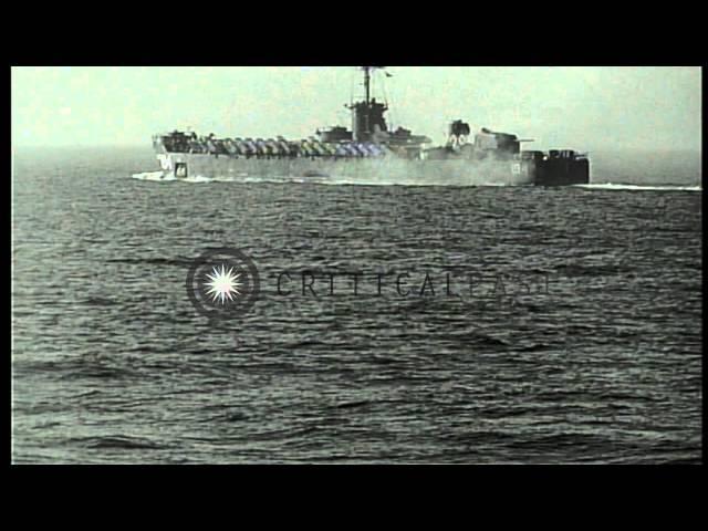 U.S. warships firing and underway during invasion of  Okinawa in World War II HD Stock Footage