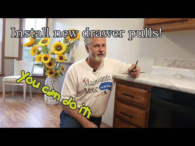 Installing new cabinet drawer pulls. Update the look of your kitchen. Do it yourself and save!