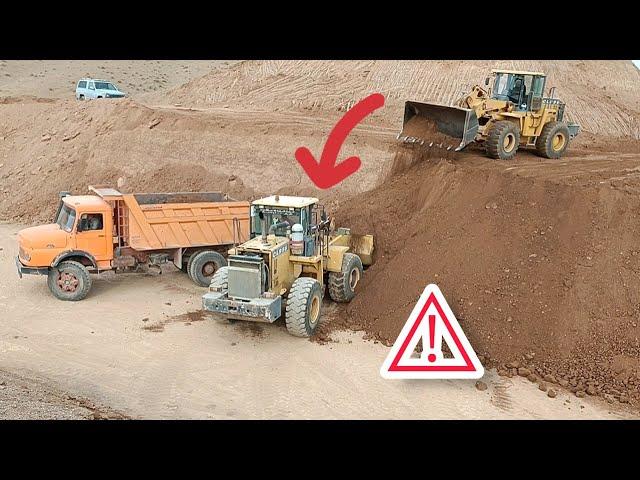 Cooperation of heavy machinery, excavators and loaders