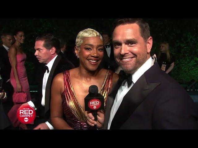 Tiffany Haddish checks On The Red Carpet's Karl Schmid's credit score at Vanity Fair Party... AGAIN!