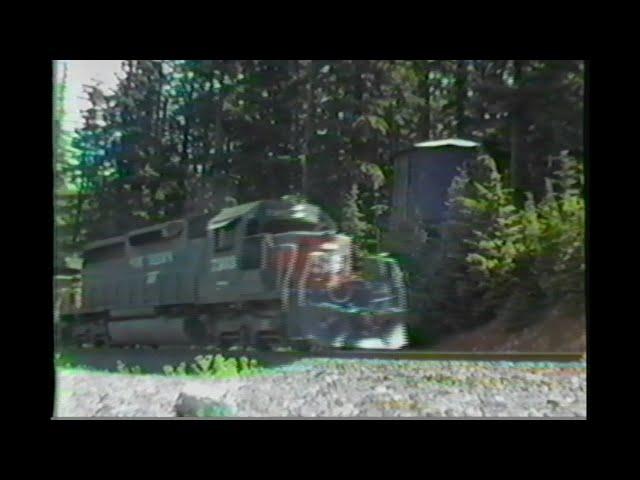 346. SOUTHERN PACIFIC SP 7303 WATER TOWER at  Cruzatte siding Oregon on August 10 1985 with 4