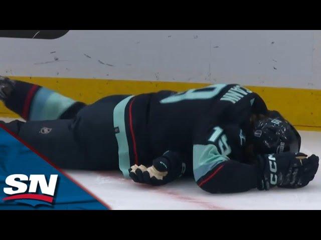 Kraken's Jared McCann Leaves The Game After Taking A Hit From Avalanche's Cale Makar Into The Boards