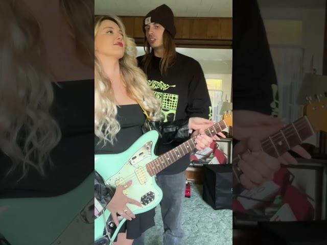 Couple plays guitar ‍️‍‍