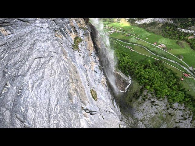 Wingsuit Flying Through A Waterfall | Lauterbrunnen 