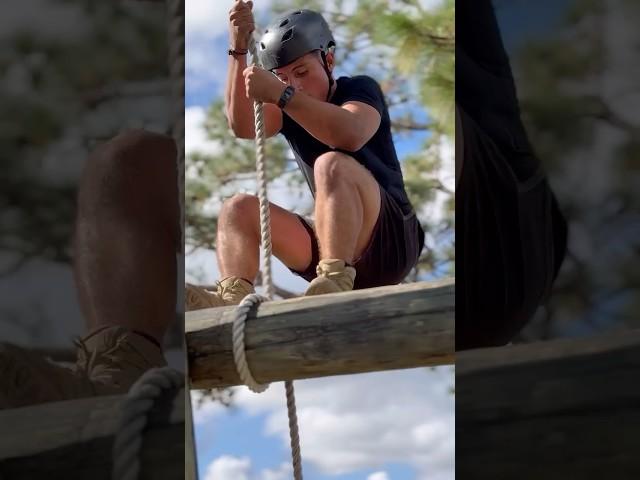 Special Forces candidates attempt obstacle course during SOCOM Athlete's Special Forces Challenge.