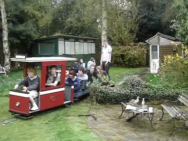 Miniature railway tram being operated by kids