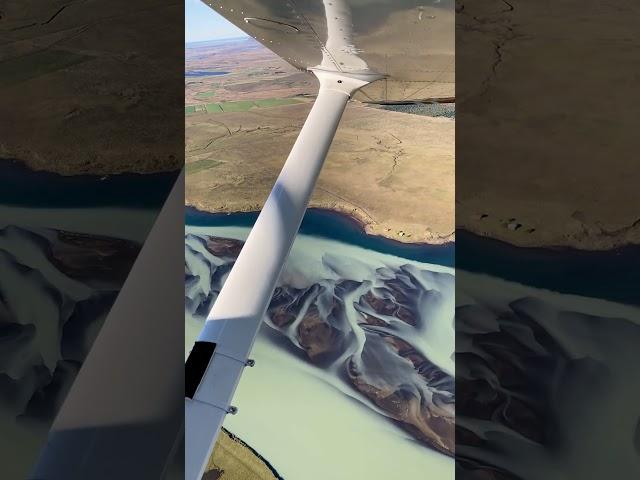 Flying over glacier river with Your private Pilot in Iceland