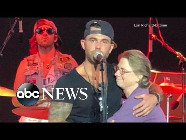 Country singer Jay Allen sings to his mom on stage