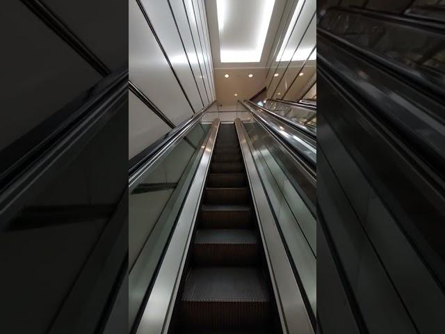 Up Ride on a Single-File Otis Escalator at Petronas Twin Towers, Kuala Lumpur