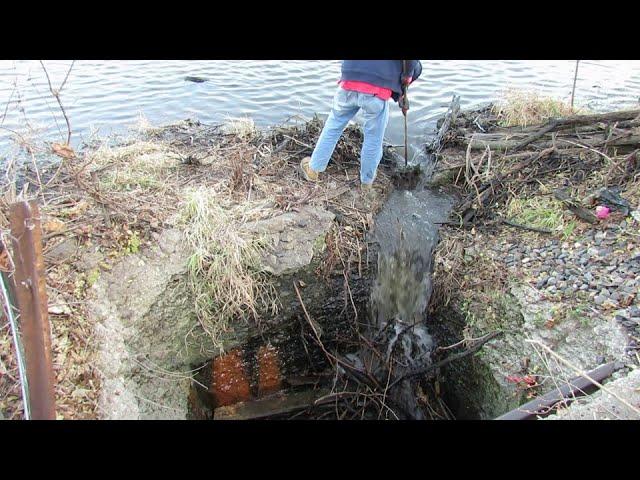 Unblocking Lake Drain Makes a Waterfall