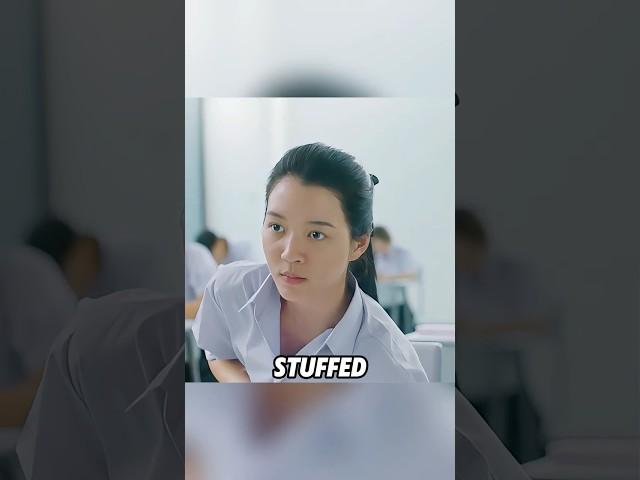 A girl cheats by writing answers on an eraser to help her friend achieve a high score.#shorts #film