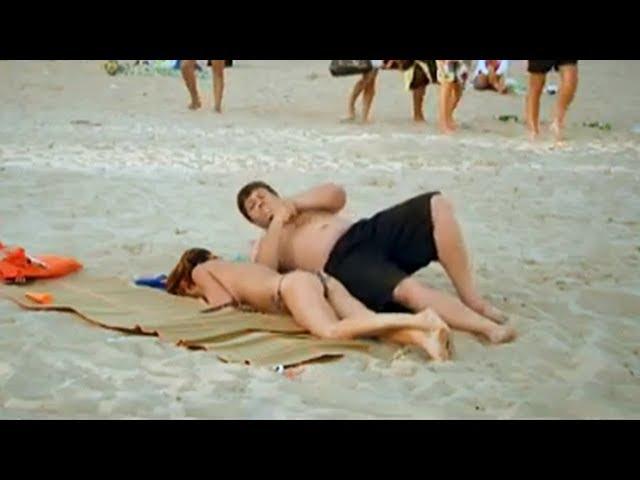 The girl fell asleep on the beach. Prank. Quite funny