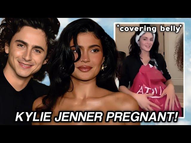 Kylie Jenner PREGNANT with Timothee Chalamet's baby? COVERS her belly! *THE TRUTH* | Cine Chic