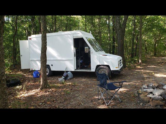 living in a campervan in the woods.