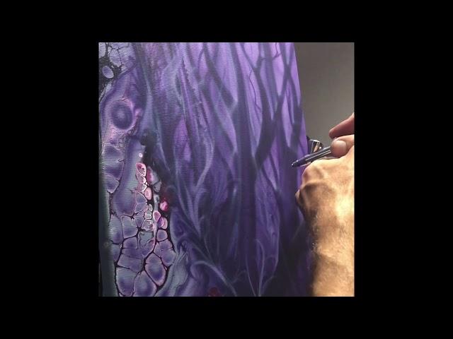 Airbrushing a quick mystical forest scene over acrylic pour