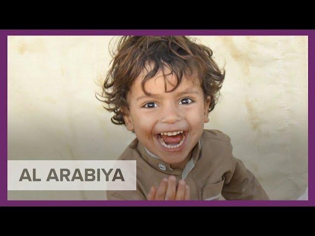 The story behind the happy, smiling photo of a Yemeni child