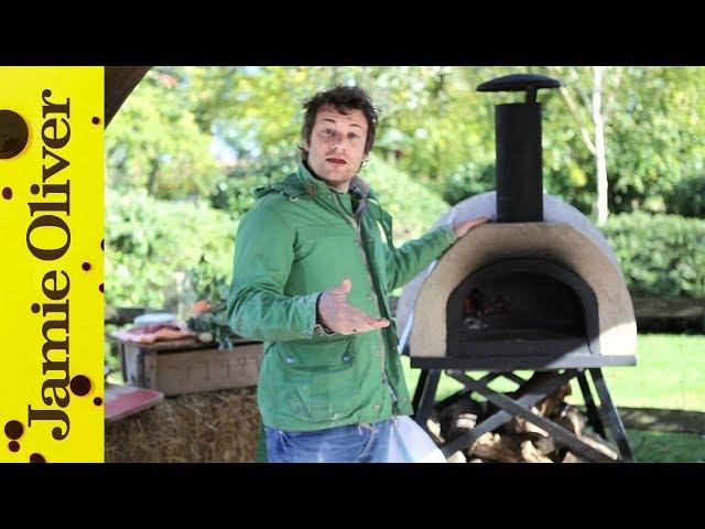 Jamie Oliver shows you how to cook pizza in a wood fired oven