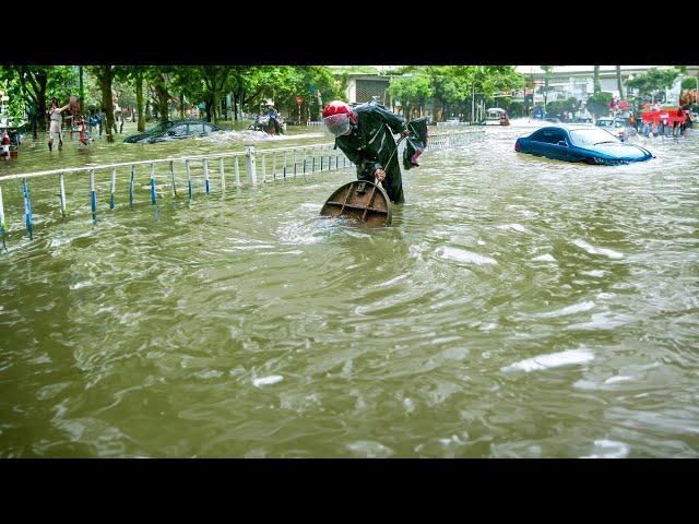 Flood Response in Action Unclogging Drains to Reclaim the Streets