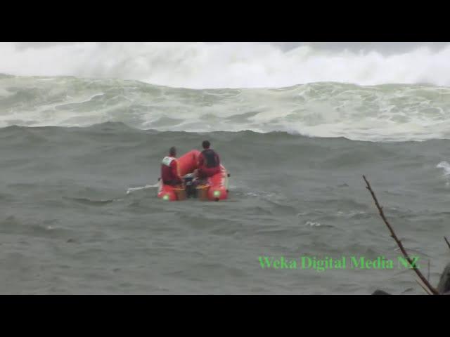 See How a Small Inflatable Crosses a Big Set of Waves at a River Bar