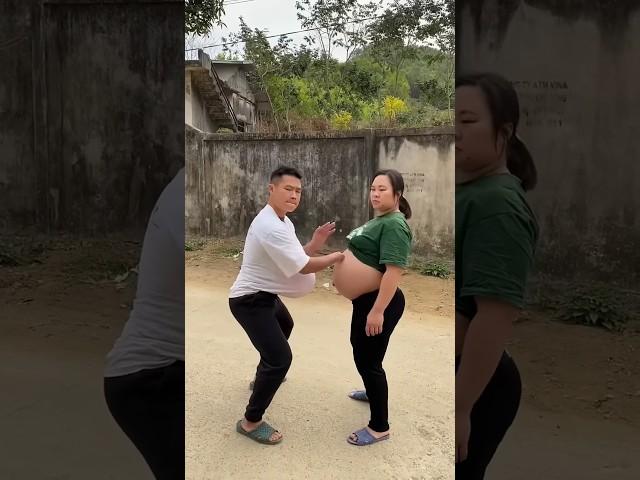 2 pregnant women playing drums