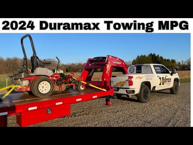 How many MPG does the new 2024 Silverado L5P Duramax get towing a heavy gooseneck trailer?