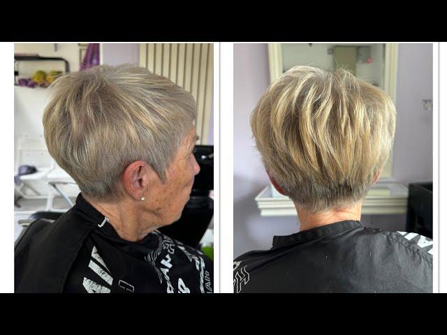 Learn how to cut a short graduated hair cut with scissor over comb NVQ level 2 and 3