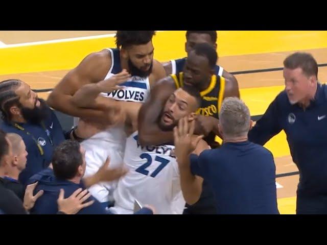 Draymond Green headlocks Rudy Gobert after Klay Thompson and Jaden McDaniels fight 