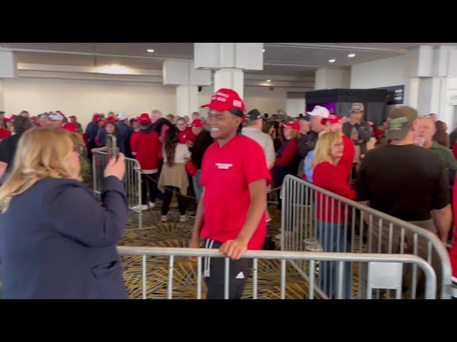 Donald Trump supporters line up ahead of Detroit rally