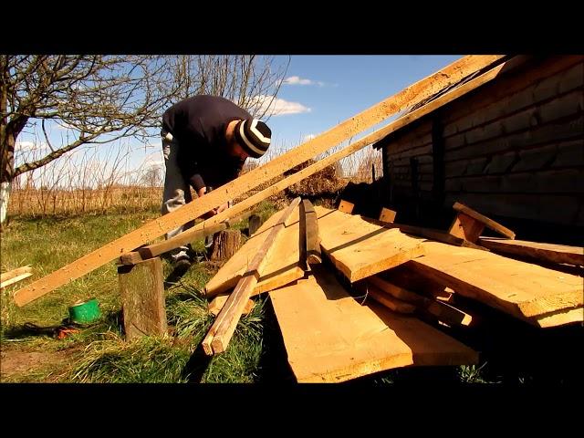 Making primitive roof for firewood on the viking court