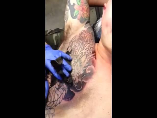 Alex Kuo of AK Irons tattooing