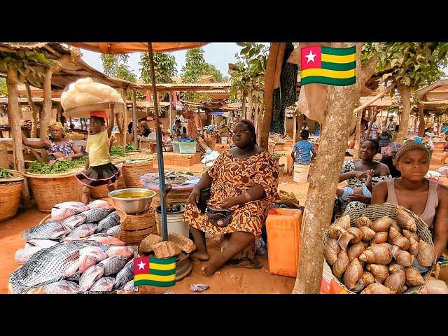 Rural African village market day in Togo  . Cheapest food Market Anfoin Togo  West Africa .