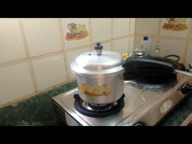 Cook rice using Pressure cooker