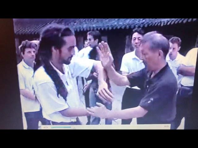 Grandmaster IP Ching chi sau with my student Carlos Lewis.in Foshan, China..