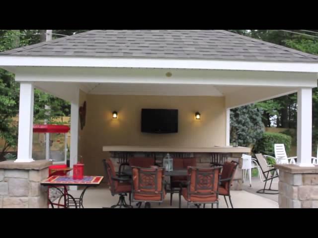 Explore This Poolside Bar with Carriage Lights | Homestead Structures Avalon Pool House