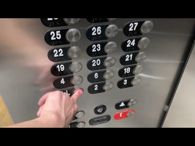 Newer Otis Series 4 Traction High-Rise Elevators at Marriott Marquis in Downtown Houston, TX.