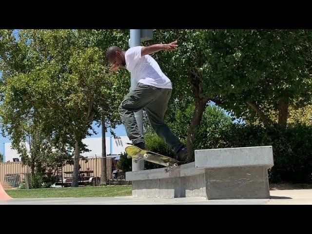 Taking a break from work to enjoy a nice day with some skateboarding.